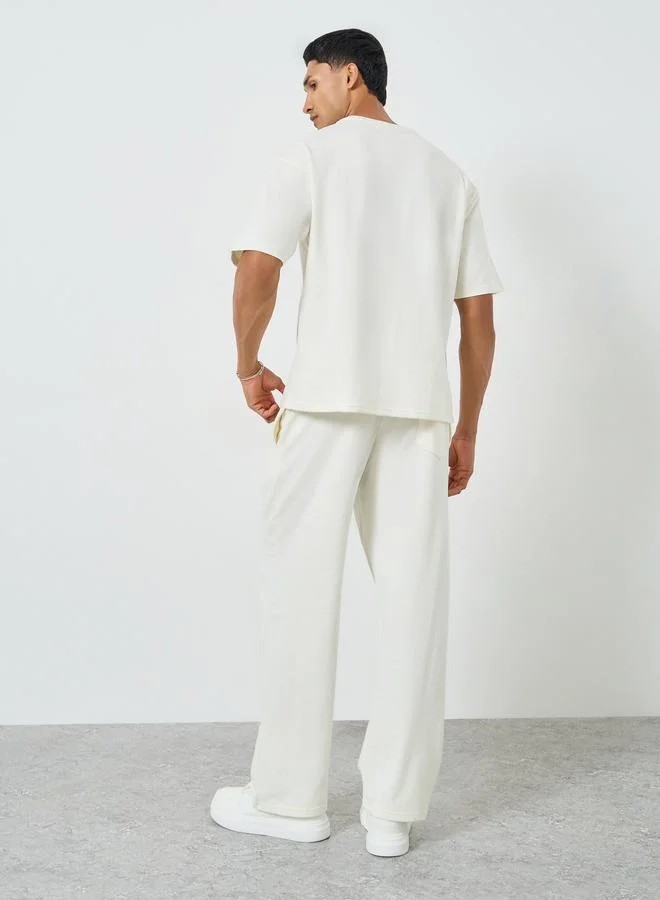 Styli  Men Cream Oversized T-Shirt and Drawstring Pants Co-Ords for Men | Best Price UAE